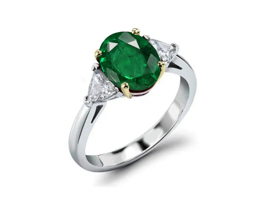 218 custom made unique oval emerald center stone and trillion diamond side three stone engagement ring