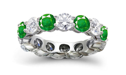 eternity ring prong set with round emeralds and diamonds