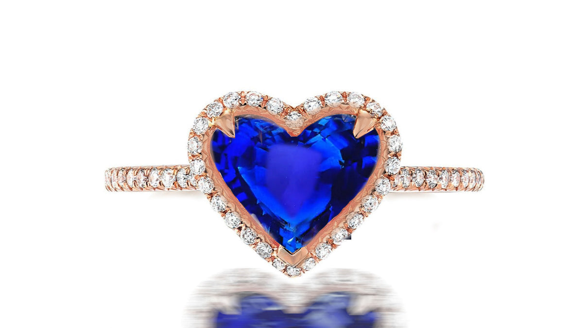 228 custom made unique heart blue sapphire center stone diamond halo and channel set diamond band engagement ring