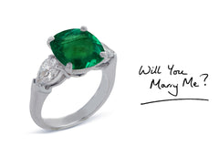 23 custom made unique cushion cut emerald center stone with pear diamond accents three stone engagement ring