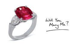 23 custom made unique cushion cut ruby center stone with pear diamond accents three stone engagement ring