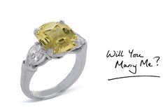 23 custom made unique cushion cut yellow sapphire center stone with pear diamond accents three stone engagement ring