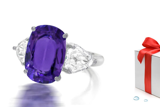 232 custom made unique oval purple sapphire center stone and fanct diamond side three stone engagement ring