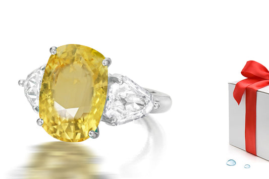 232 custom made unique oval yellow sapphire center stone and fanct diamond side three stone engagement ring