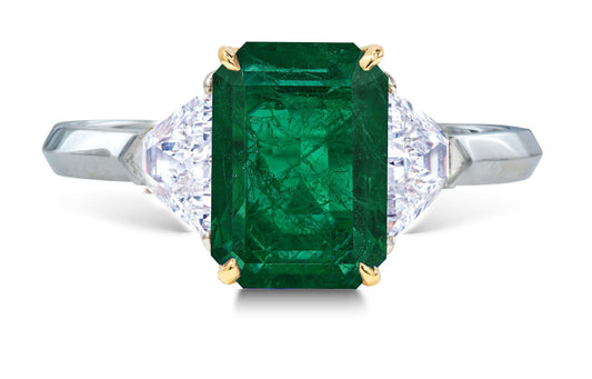 25 custom made unique emerald cut emerald center stone with trillion diamond accents three stone engagement ring