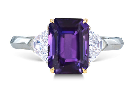 25 custom made unique emerald cut purple sapphire center stone with trillion diamond accents three stone engagement ring