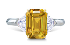 25 custom made unique emerald cut yellow sapphire center stone with trillion diamond accents three stone engagement ring