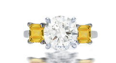 253 custom made unique round diamond center stone and square yellow sapphire accent three stone engagement ring