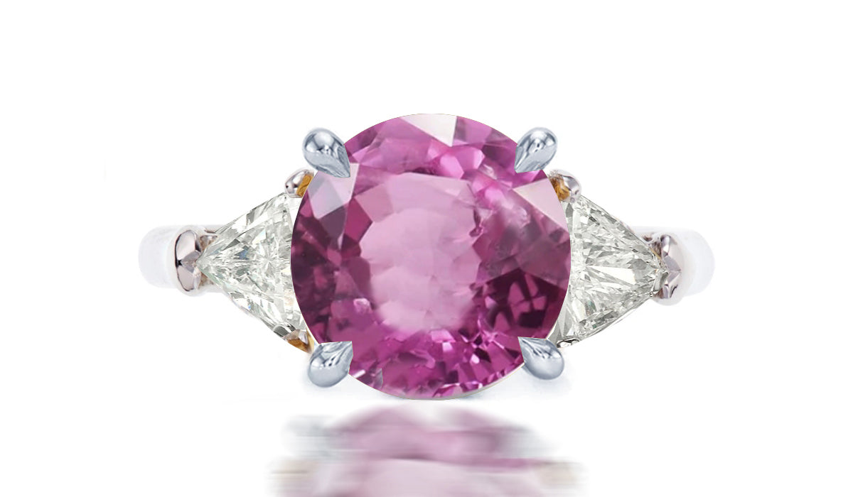 254 custom made unique round pink sapphire center stone and trillion diamond accent three stone engagement ring