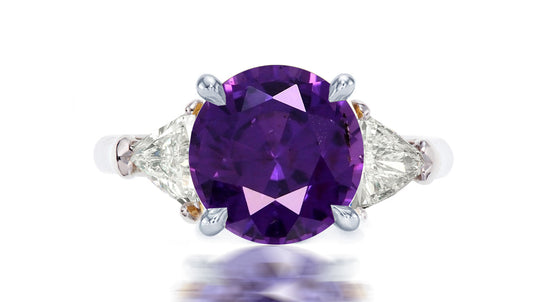 254 custom made unique round purple sapphire center stone and trillion diamond accent three stone engagement ring