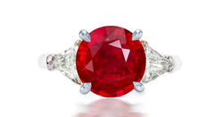 254 custom made unique round ruby center stone and trillion diamond accent three stone engagement ring