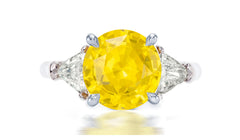 254 custom made unique round yellow sapphire center stone and trillion diamond accent three stone engagement ring