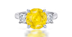 257 custom made unique round yellow sapphire center stone and asscher cut diamond accent three stone engagement ring