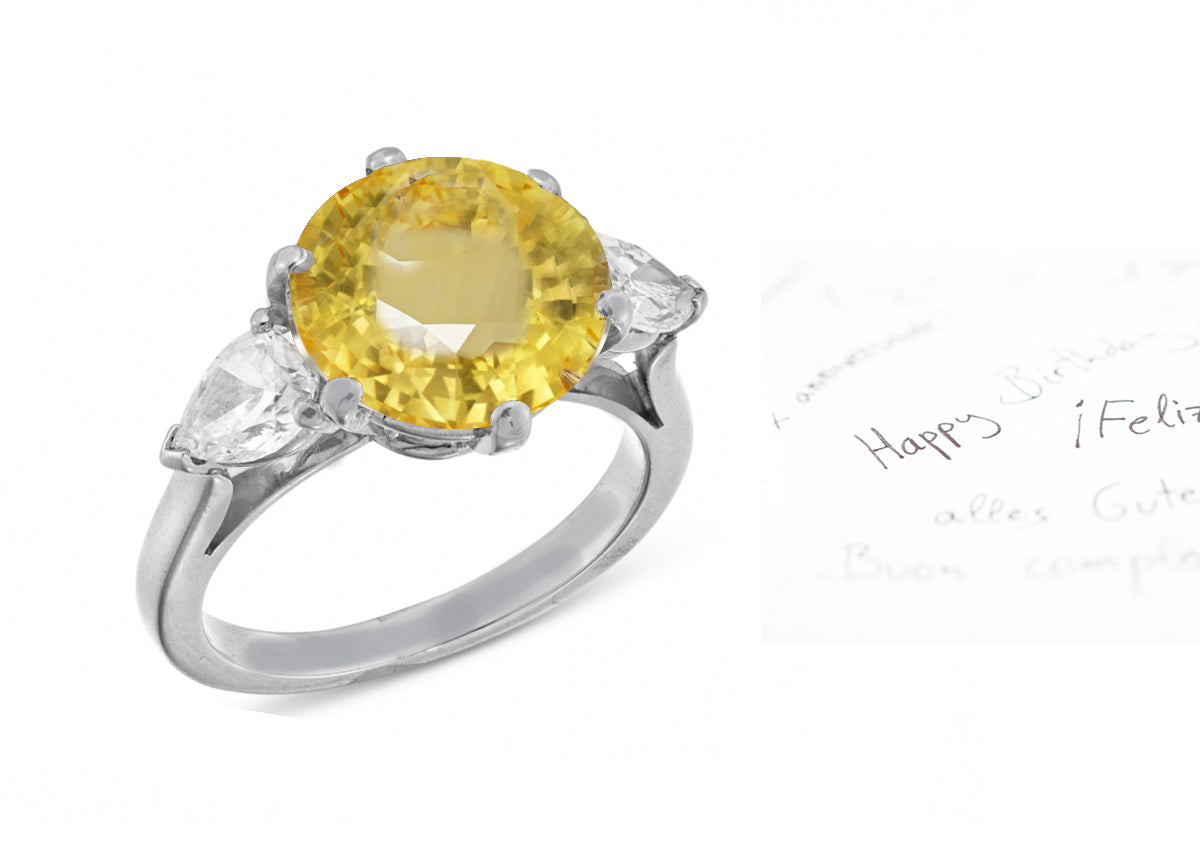 26 custom made unique round yellow sapphire center stone with pear diamond accents three stone engagement ring