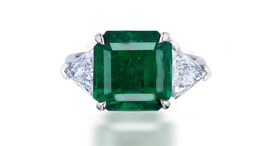 261 custom made unique square emerald center stone and trillion diamond accent three stone engagement ring