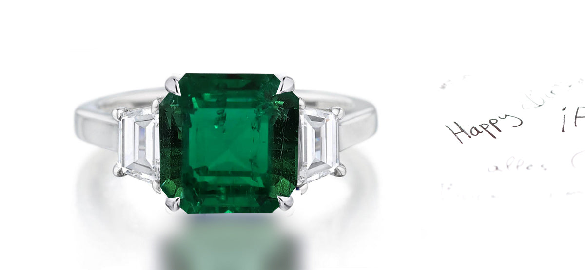 263 custom made unique square emerald center stone and trapezoid cut diamond accent three stone engagement ring