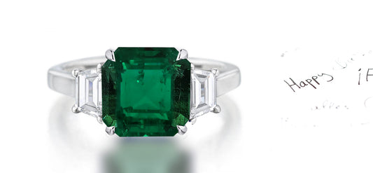 263 custom made unique square emerald center stone and trapezoid cut diamond accent three stone engagement ring