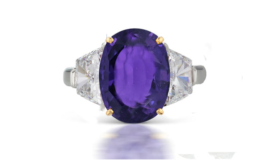 266 custom made unique oval purple sapphire center stone and trapezoid diamond accent three stone engagement ring