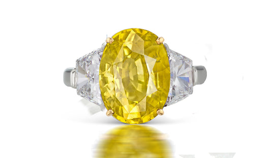 266 custom made unique oval yellow sapphire center stone and trapezoid diamond accent three stone engagement ring