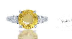 267 custom made unique round yellow sapphire center stone and pear diamond accent three stone engagement ring