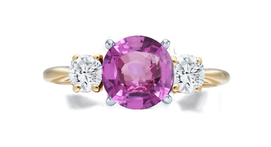 269 custom made unique round pink sapphire center stone and round diamond accent three stone engagement ring