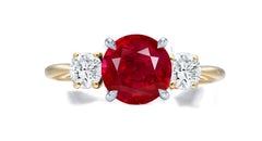 269 custom made unique round ruby center stone and round diamond accent three stone engagement ring