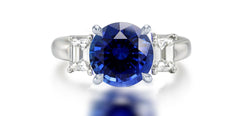 272 custom made unique round blue sapphire center stone and emerald cut diamond accent three stone engagement ringa