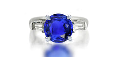 273 custom made unique round blue sapphire center stone and baguette cut diamond accent three stone engagement ring