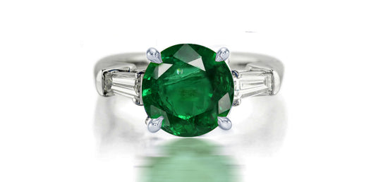 273 custom made unique round emerald center stone and baguette cut diamond accent three stone engagement ring