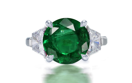 274 custom made unique round emerald center stone and trapezoid diamond accent three stone engagement ring