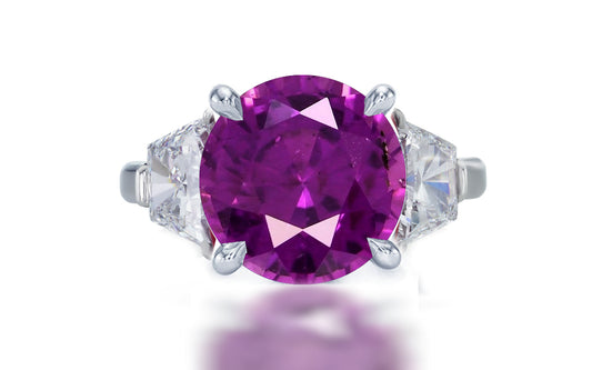 274 custom made unique round purple sapphire center stone and trapezoid diamond accent three stone engagement ring