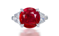 274 custom made unique round ruby center stone and trapezoid diamond accent three stone engagement ring