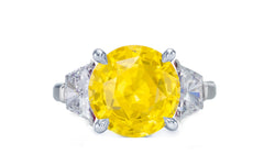 274 custom made unique round yellow sapphire center stone and trapezoid diamond accent three stone engagement ring