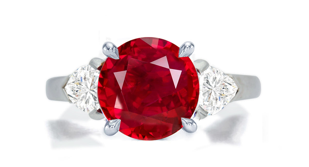 276 custom made unique round ruby center stone and heart diamond accent three stone engagement ring