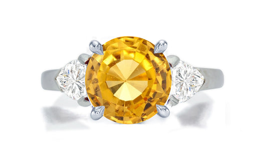 276 custom made unique round yellow sapphire center stone and heart diamond accent three stone engagement ring