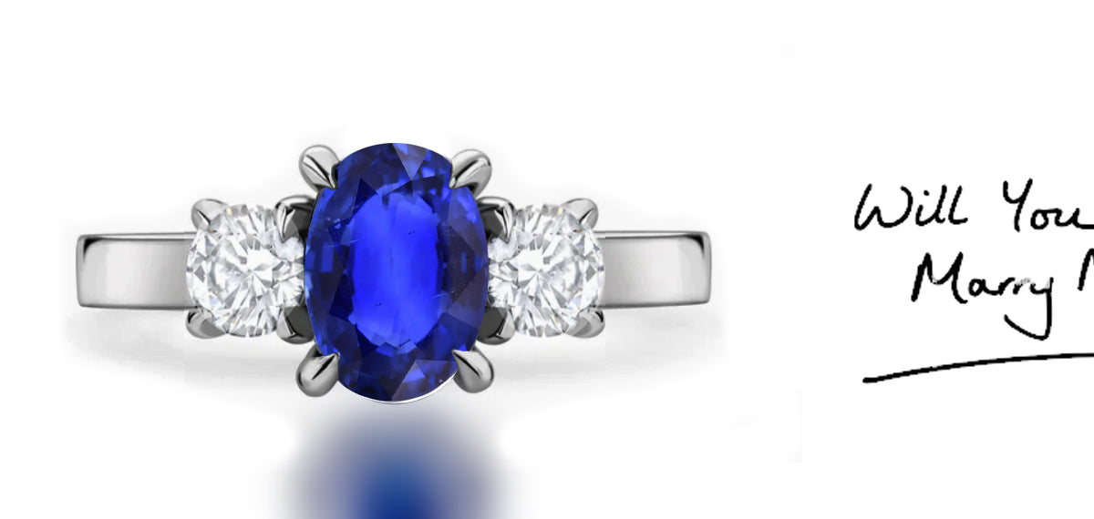 286 custom made unique oval blue sapphire center stone and round diamond accent three stone engagement ring