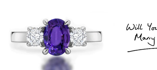 286 custom made unique oval purple sapphire center stone and round diamond accent three stone engagement ring