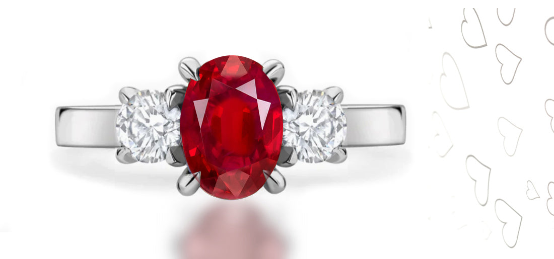 286 custom made unique oval ruby center stone and round diamond accent three stone engagement ring