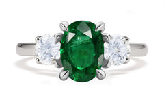 289 custom made unique oval emerald center stone and round diamond accent three stone engagement ring