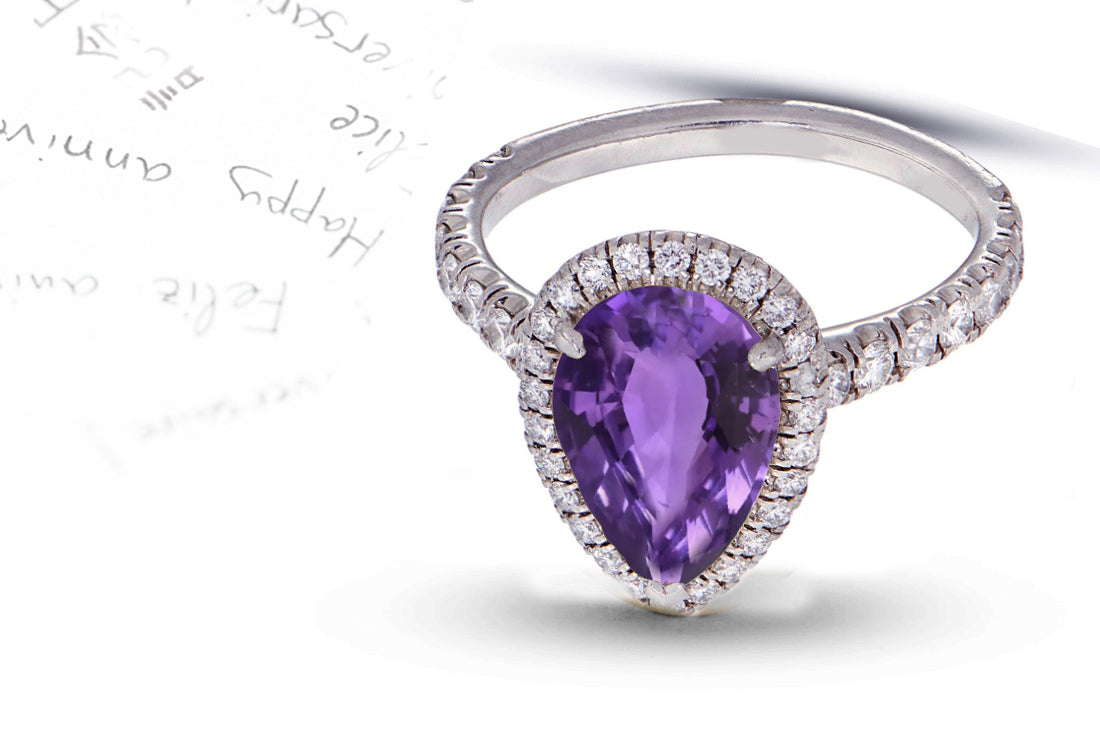 29 custom made unique pear purple sapphire center stone with diamond halo and side diamond accents engagement ring