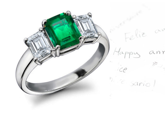 engagement ring three stone with emerald cut emerald and diamonds