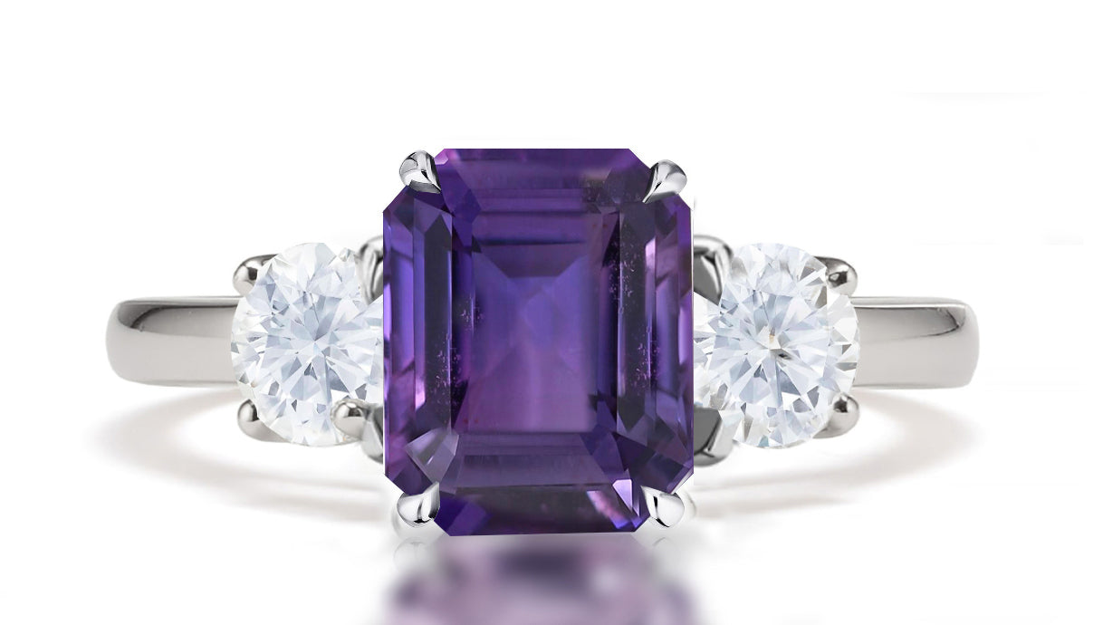 290 custom made unique emerald cut purple sapphire center stone and round diamond accent three stone engagement ring