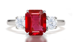 290 custom made unique emerald cut ruby center stone and round diamond accent three stone engagement ring