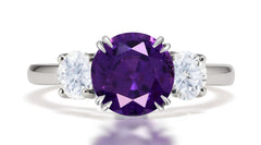 292 custom made unique round purple sapphire center stone and round diamond accent three stone engagement ring