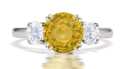 292 custom made unique round yellow sapphire center stone and round diamond accent three stone engagement ring