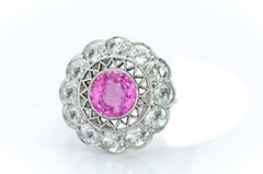 3 custom made pink sapphire and diamond flower halo engagement rings