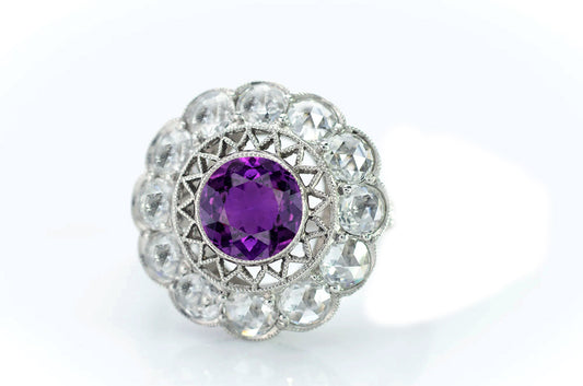 3 custom made purple sapphire and diamond flower halo engagement rings