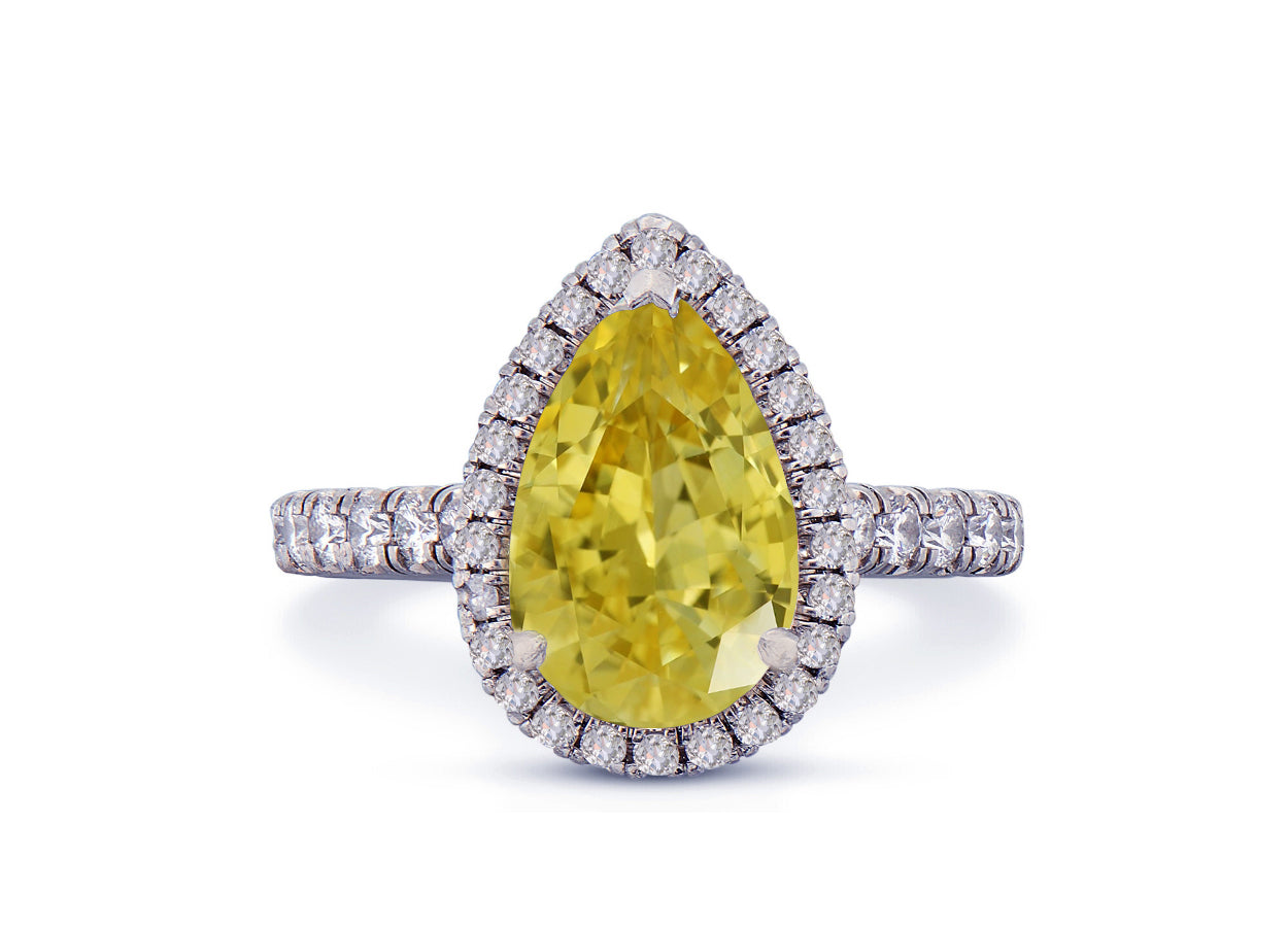 29 custom made unique pear yellow sapphire center stone with diamond halo and side diamond accents engagement ring