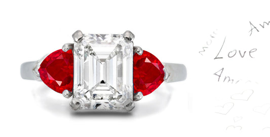 303 custom made unique emerald cut diamond center stone and heart ruby accent three stone engagement ring