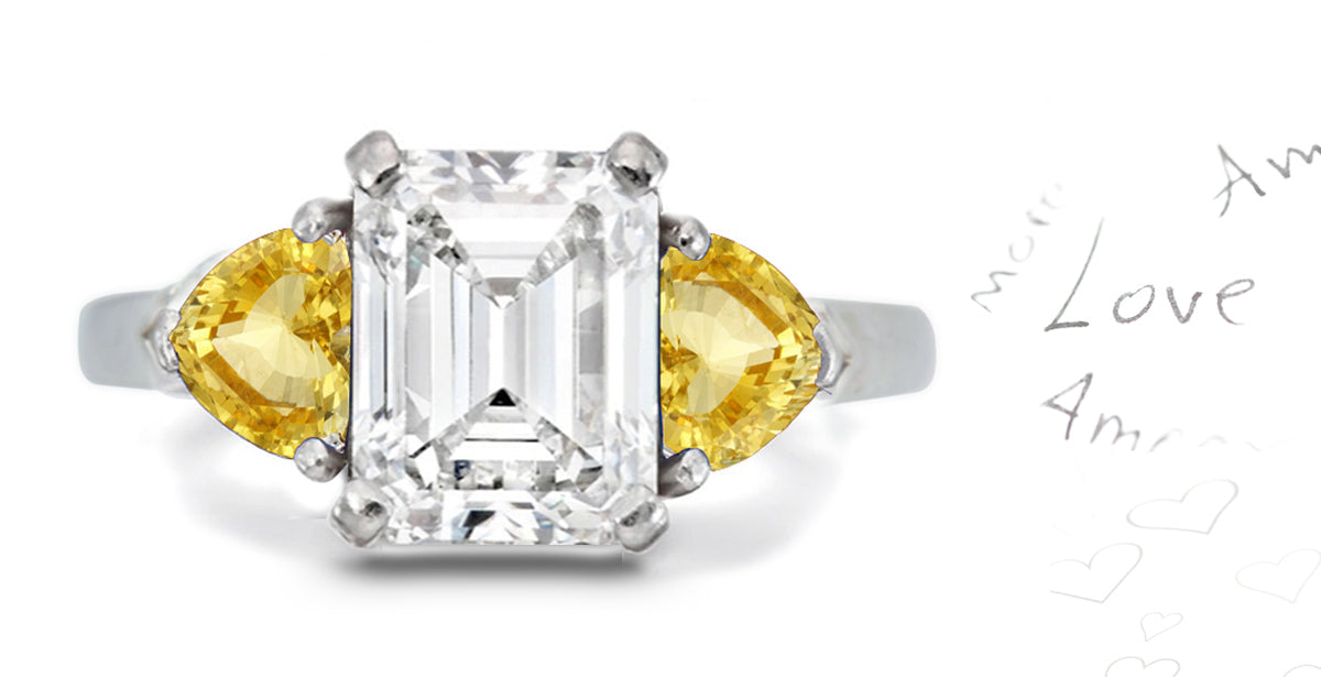 303 custom made unique emerald cut diamond center stone and heart yellow sapphire accent three stone engagement ring